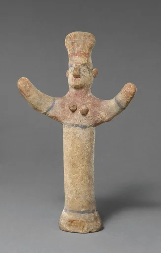 Standing female figurine of the "goddess with uplifted arms" type