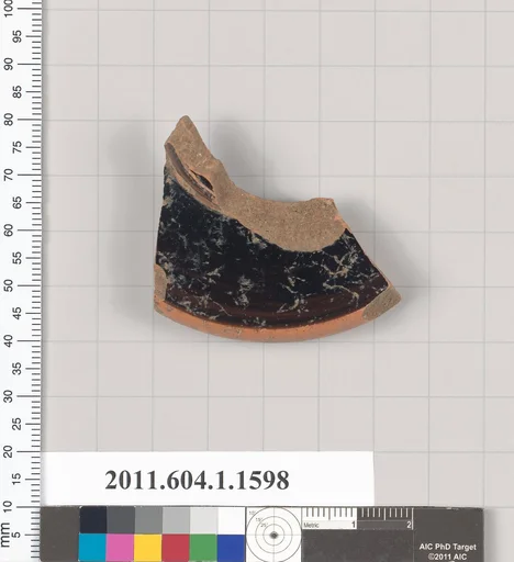 Terracotta fragment of a kylix (drinking cup)