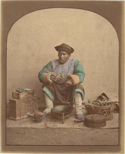 [Chinese Man Sitting with Tools]