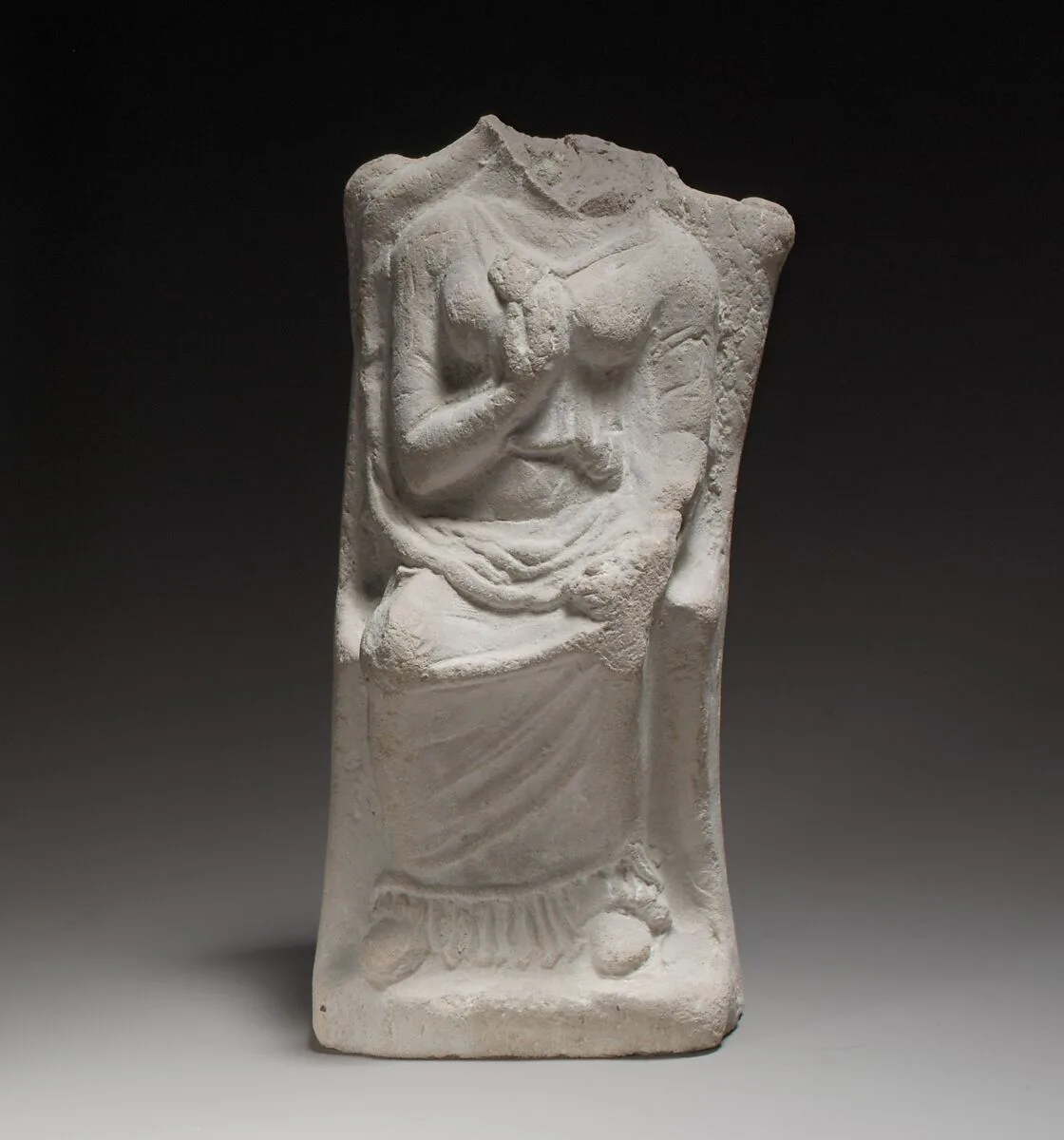 Terracotta statuette of a seated goddess — Unknown