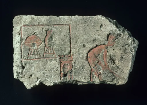 Relief with man sweeping