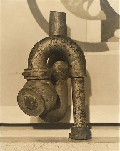 "God" by Baroness Elsa von Freytag-Loringhoven and Morton Schamberg