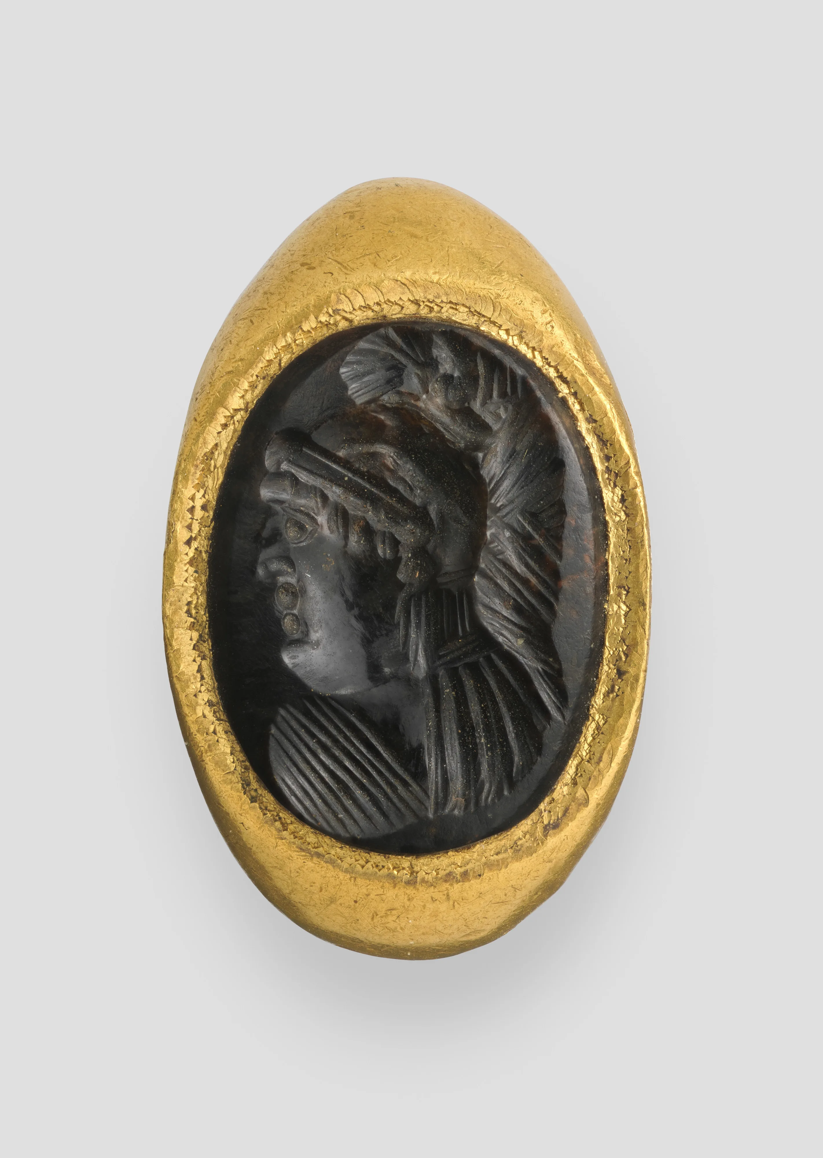 Ring with gem intaglio of helmeted head — Unknown