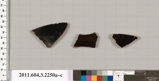 Terracotta fragments of kylikes (drinking cups)