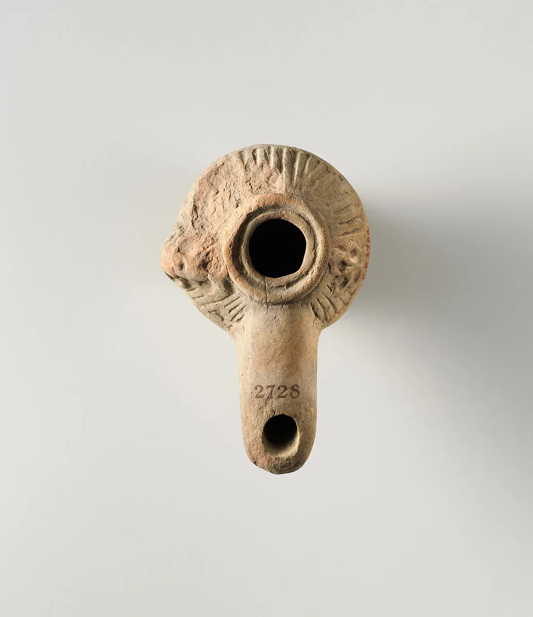Terracotta oil lamp — Unknown