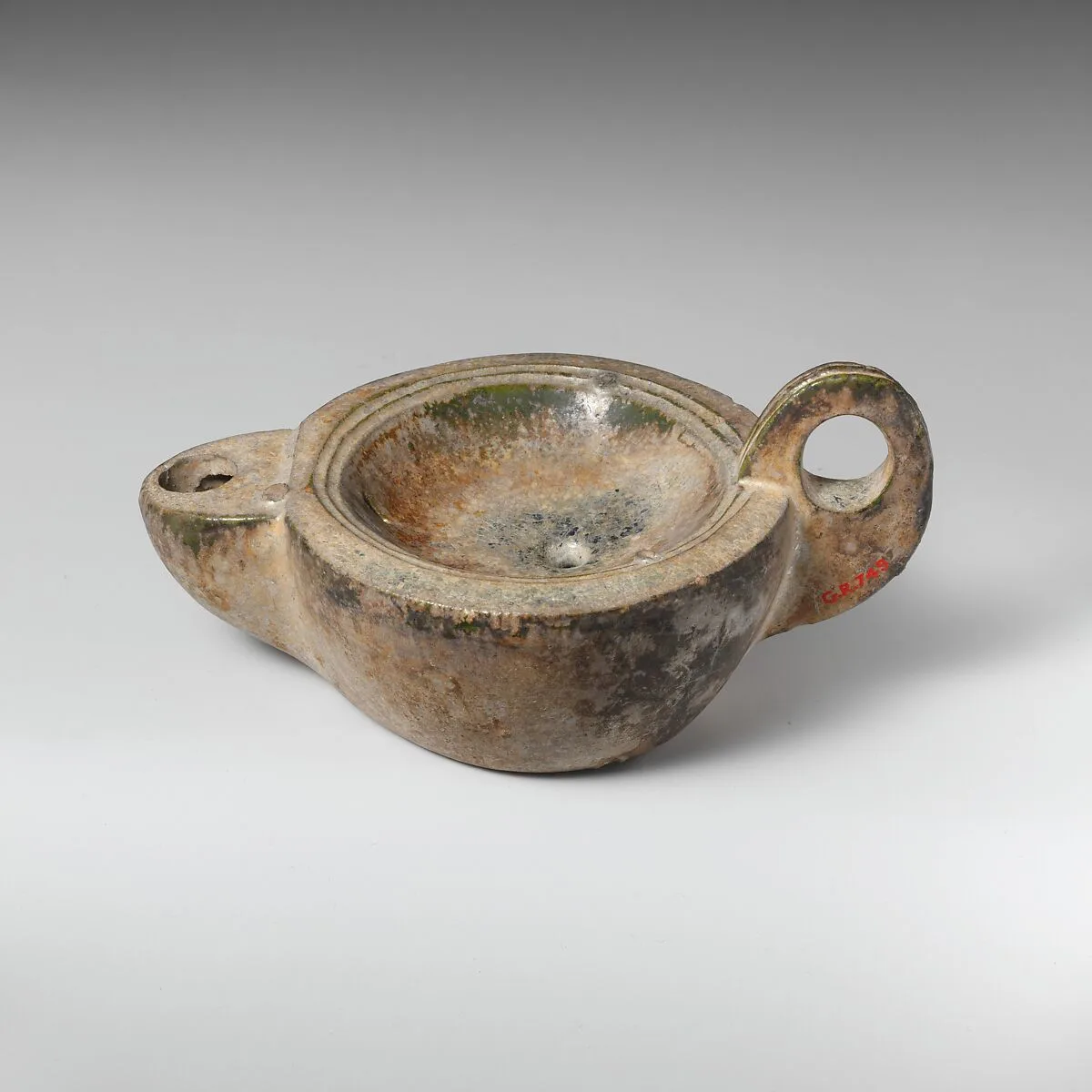 Terracotta oil lamp — Unknown