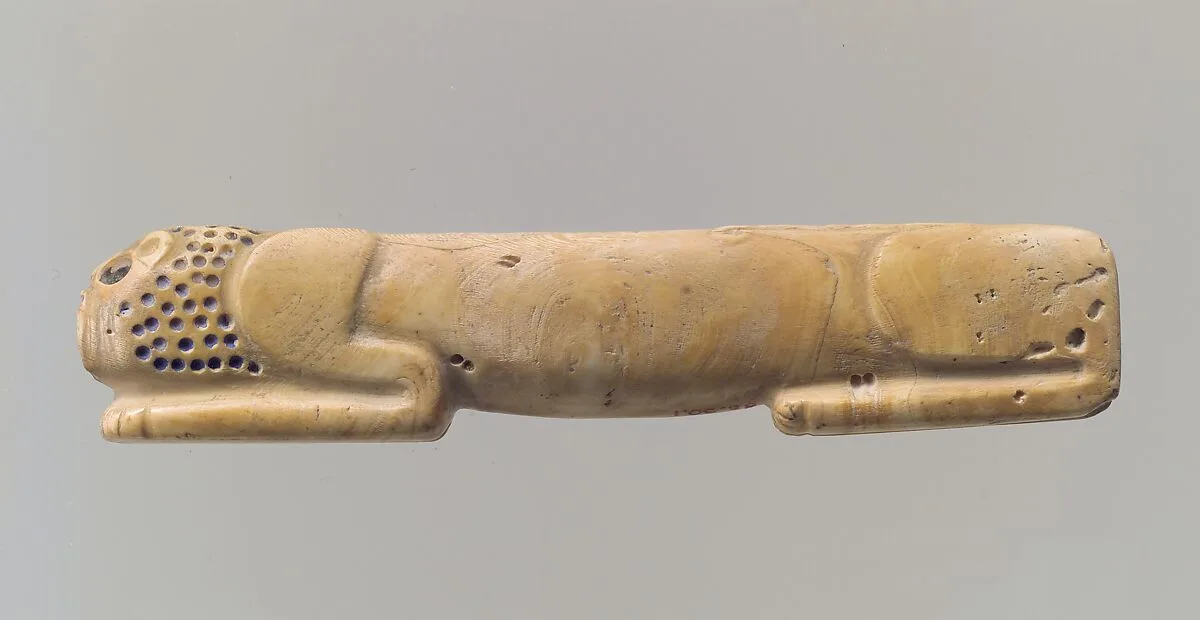Amulet in the form of a couchant lion — Unknown