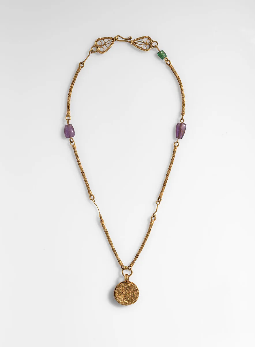 Gold Necklace with Gold Cross, Two Amethysts, and an Emerald Plasma — Unknown