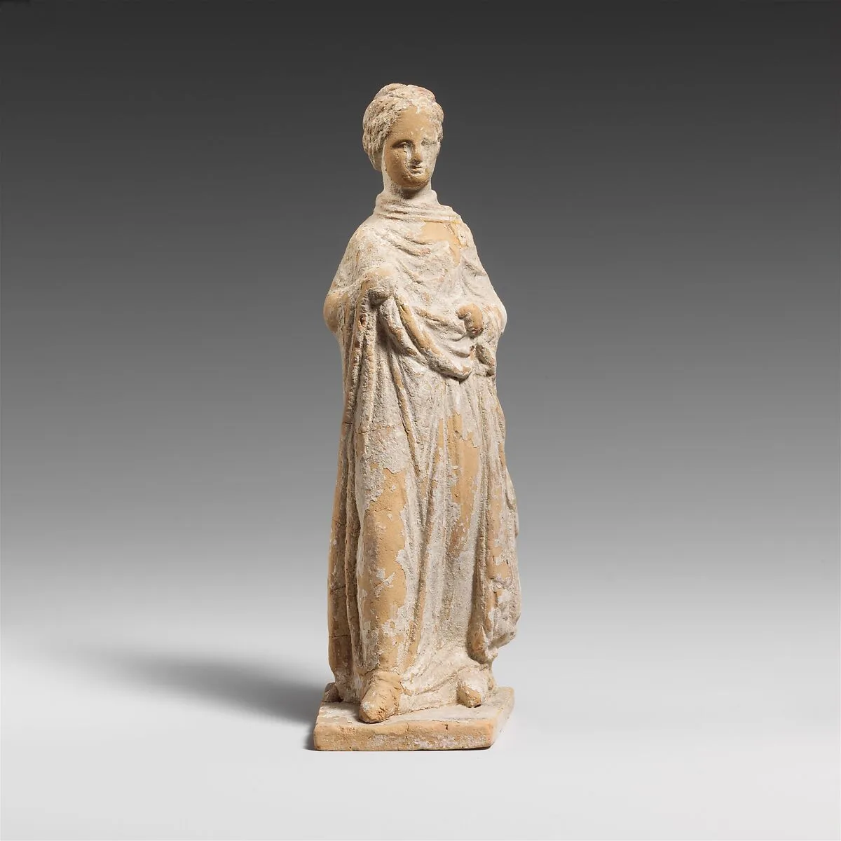 Terracotta statuette of a draped woman — Unknown