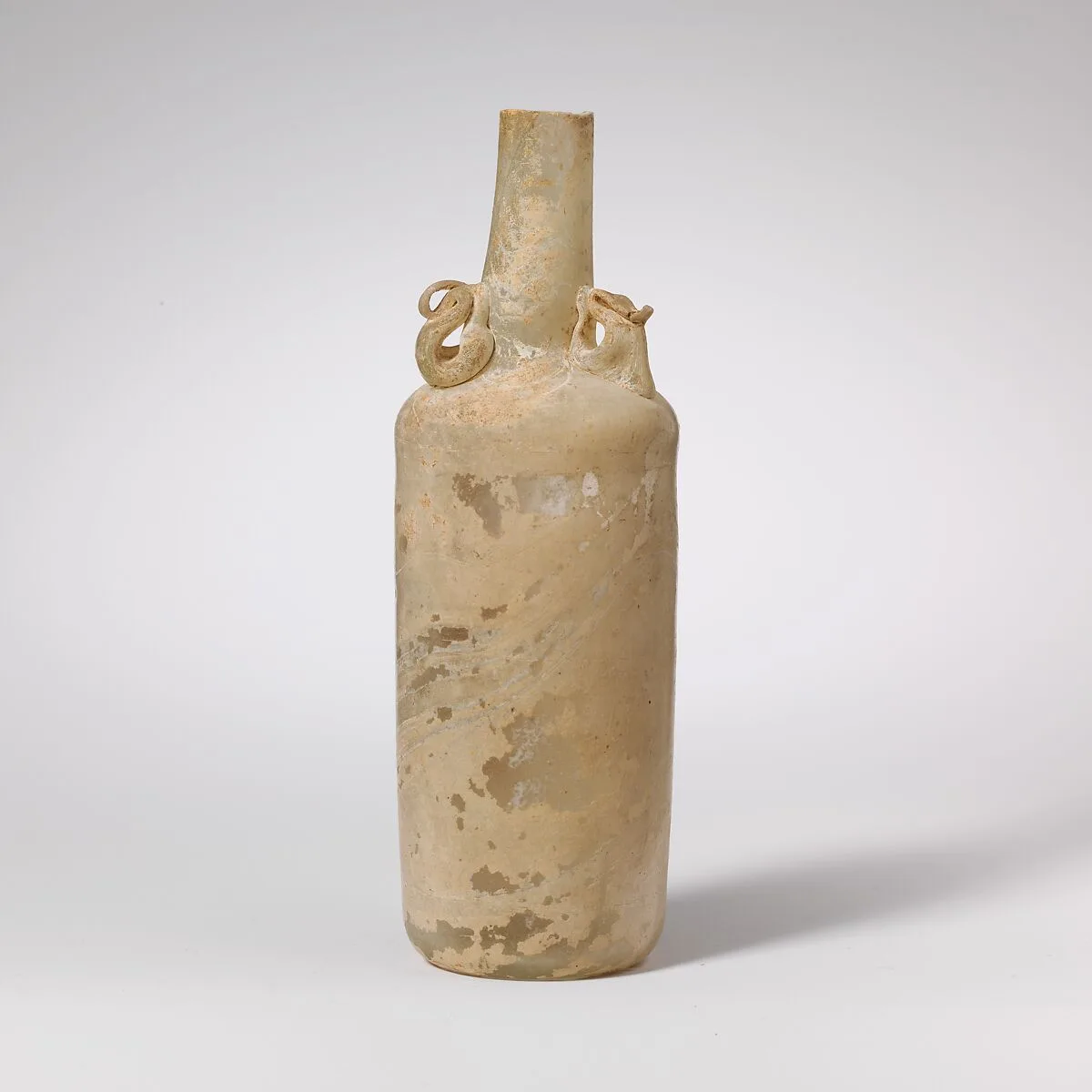 Glass bottle with dolphin handles — Unknown