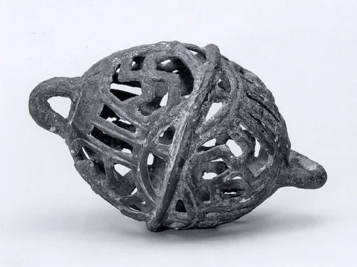 Openwork rattle bell