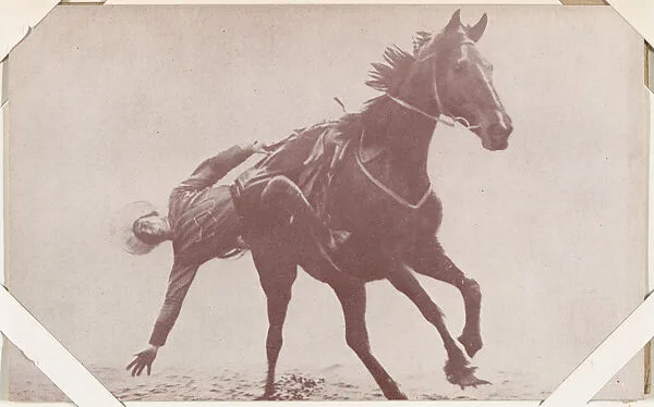 Cowboy falling off side of horse from Indians and Western Historical Scenes series (W417) — Unknown