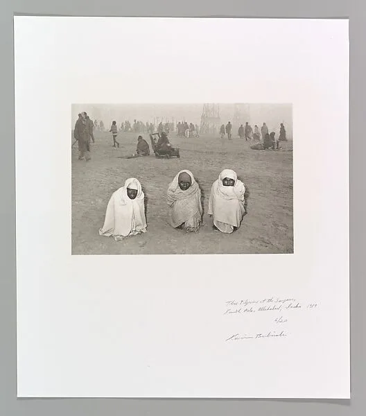 Three Pilgrims at the Sangam, Kumbh Mela, Allahabad, India — Kevin Bubriski