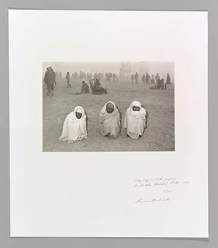 Three Pilgrims at the Sangam, Kumbh Mela, Allahabad, India