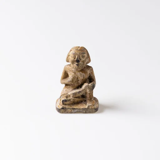 Design Amulet, Woman Suckling a Child on Back, Device showing Geometricized Monkeys