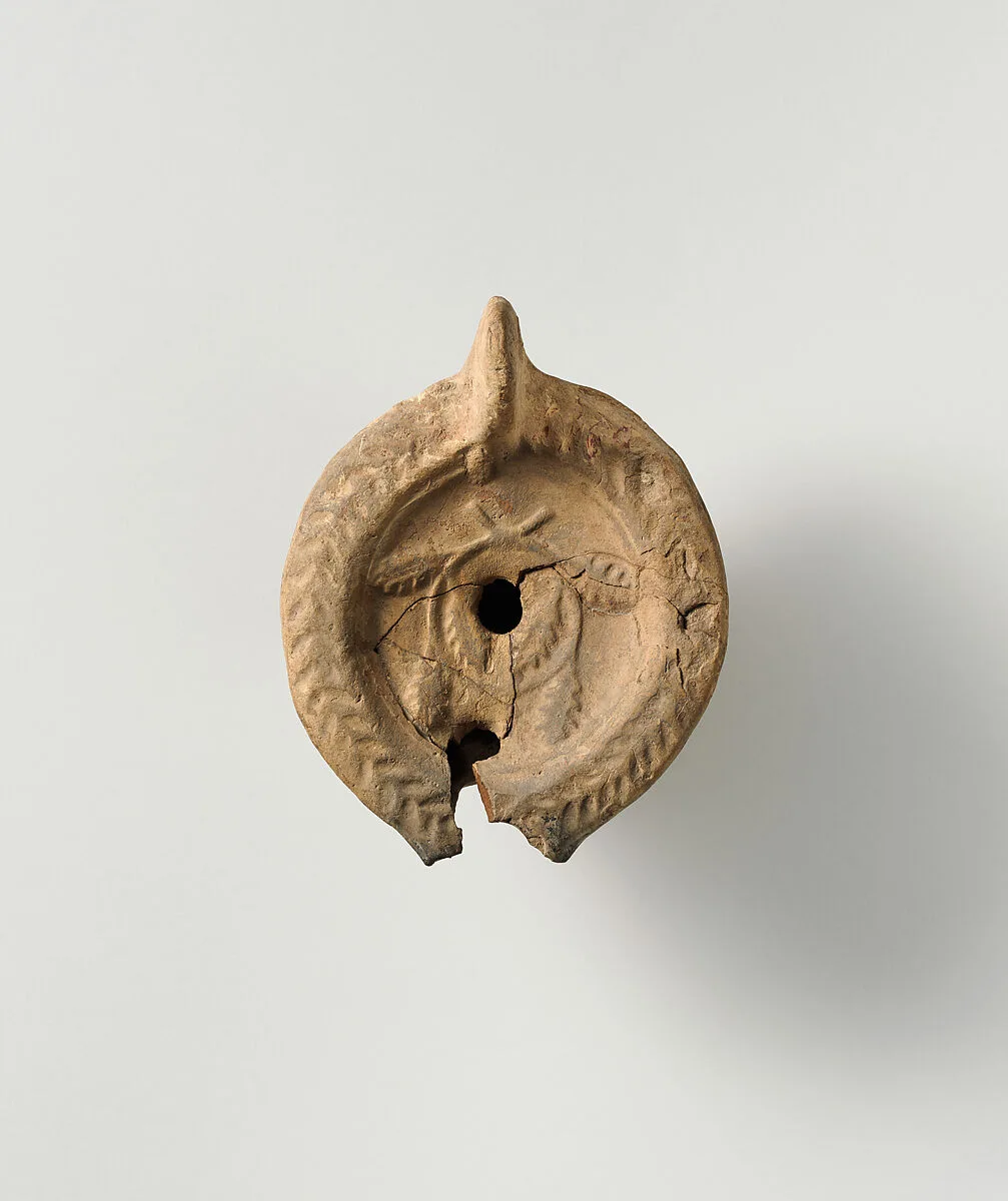 Terracotta oil lamp — Unknown