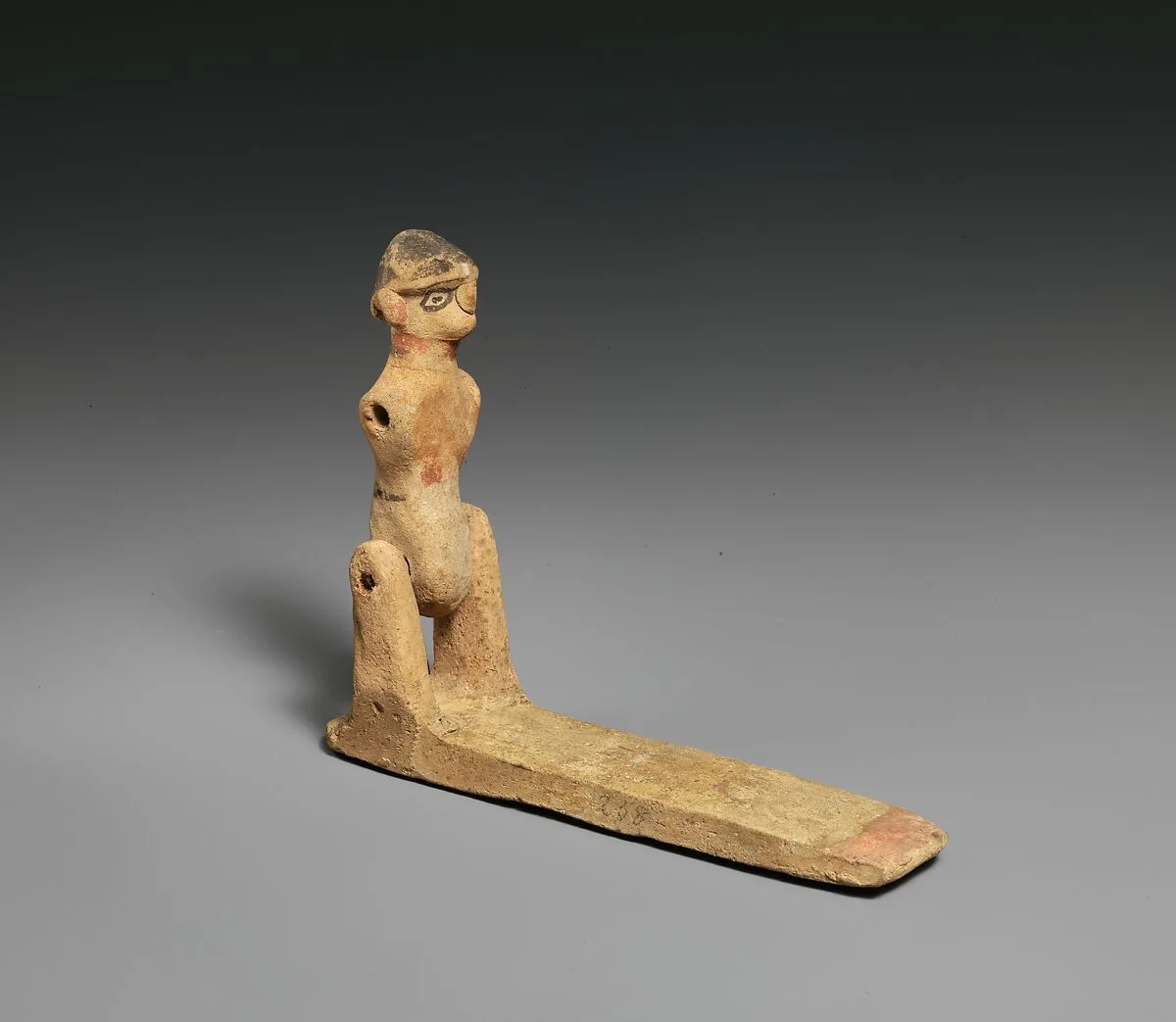 Toy in the form of a male(?) figure — Unknown