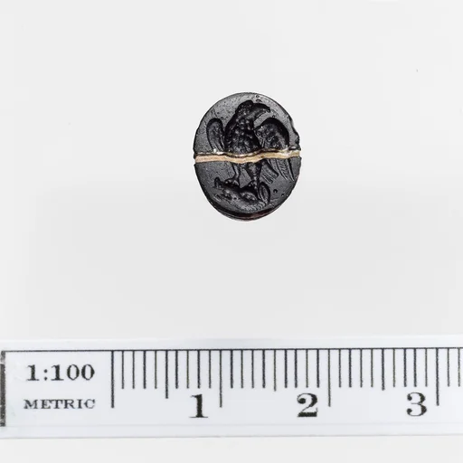 Opaque black glass ring stone with a white band