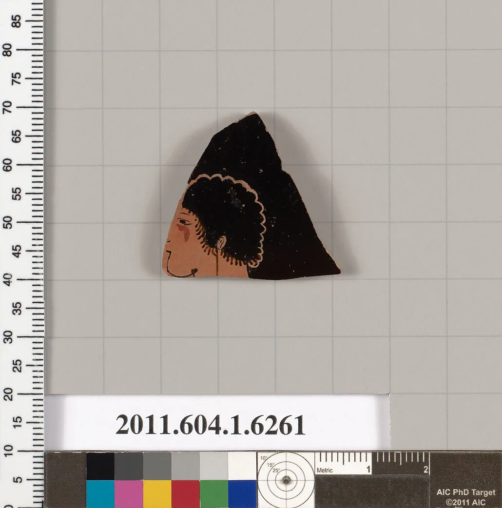 Terracotta fragment of a kylix (drinking cup) — Onesimos