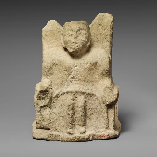 Limestone statuette of a seated Zeus Ammon