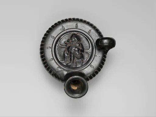 Terracotta guttus (flask with handle and vertical spout)