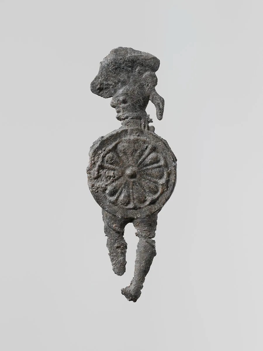 Lead figure of a warrior with a helmet and shield — Unknown