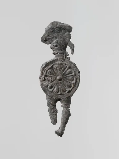 Lead figure of a warrior with a helmet and shield