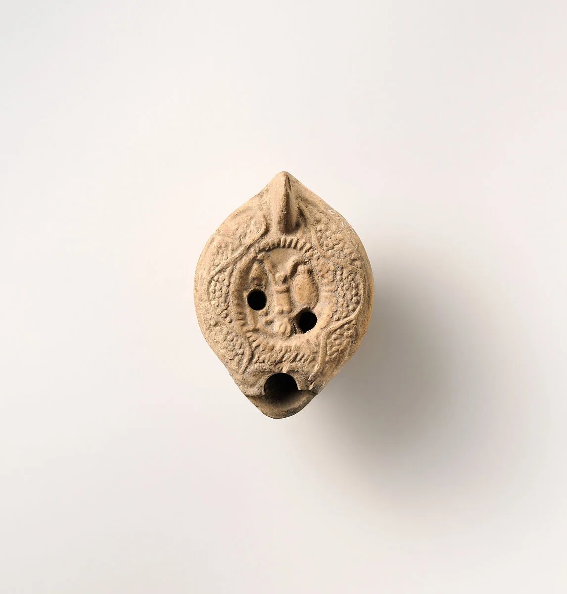 Terracotta oil lamp — Unknown