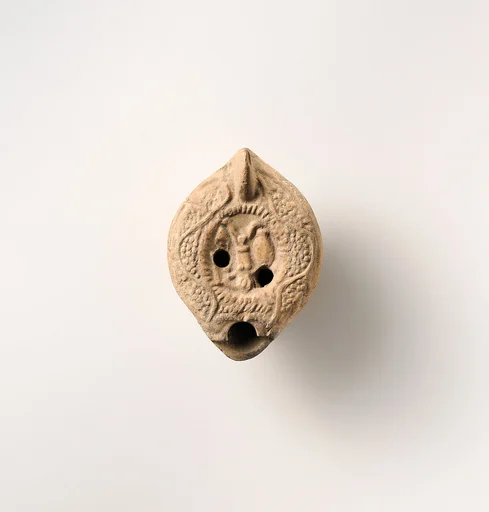 Terracotta oil lamp