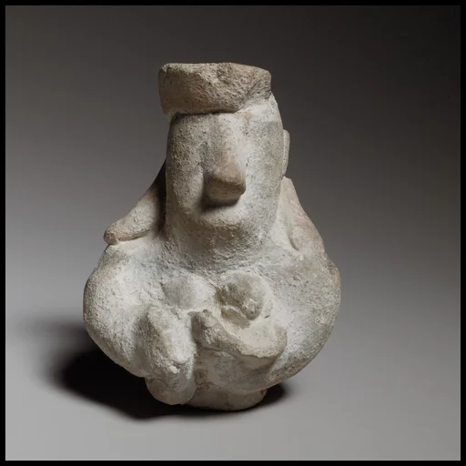 Head and upper body of a female figurine