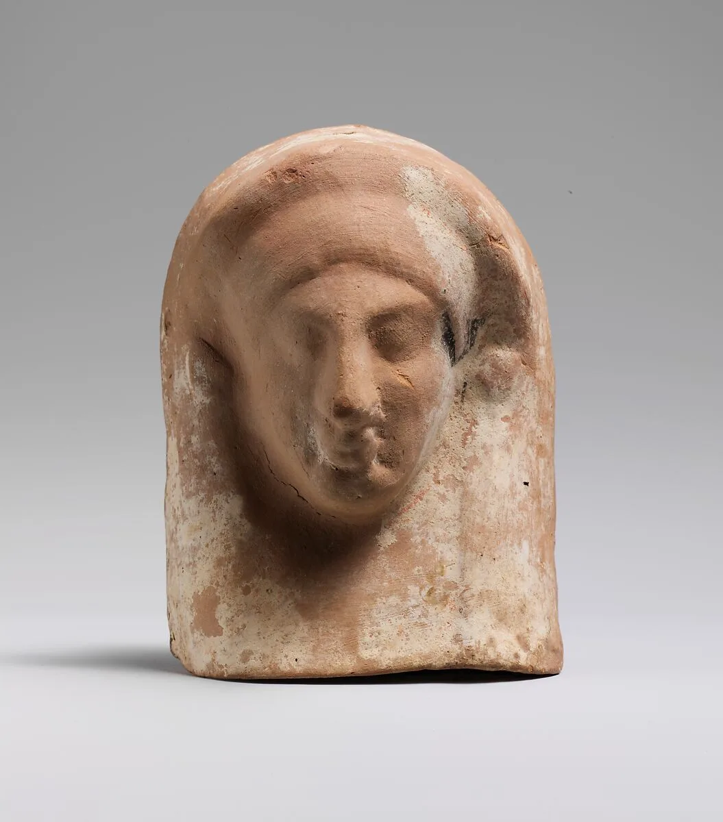Terracotta relief with head of a woman — Unknown
