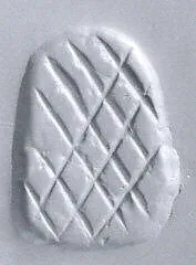 Loop-handled wedge-shaped stamping device — Unknown
