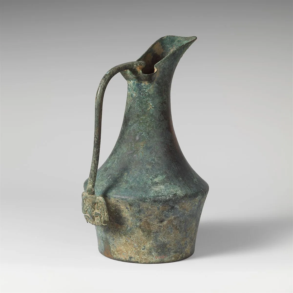 Bronze jug with handle attachment showing running youth — Unknown