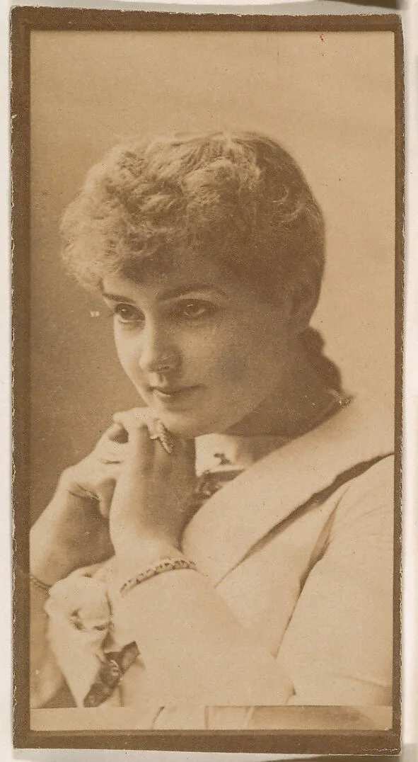 Actress resting chin on hands from the Actresses series (N664) promoting Old Fashion Fine Cut Tobacco — Unknown