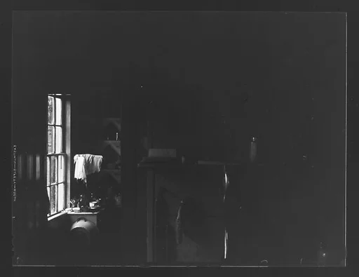 [Kitchen Interior Showing Stove with View Into Pantry (Dark View)]