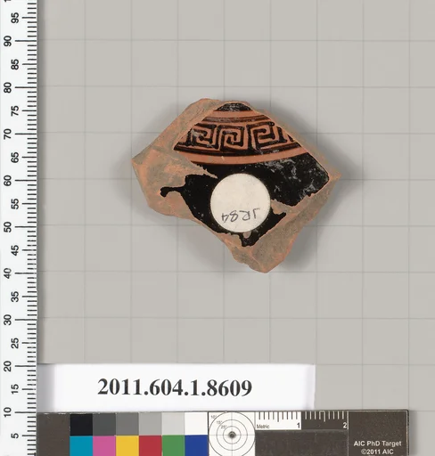 Terracotta fragment of a stemless kylix (drinking cup)