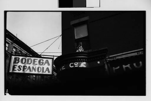 [Child Behind Barred Window Above Spanish Bodega Sign, New York City]