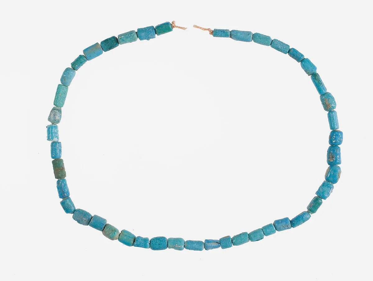 String of Short Cylindrical Beads — Unknown