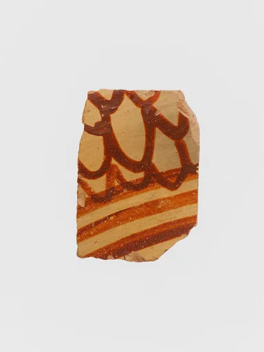 Terracotta vessel fragment with three bands and a scale pattern