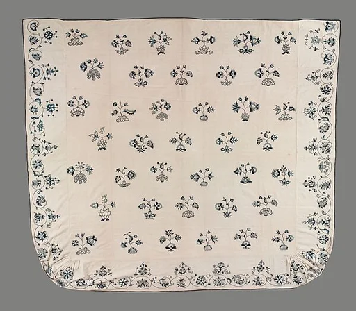 Embroidered coverlet