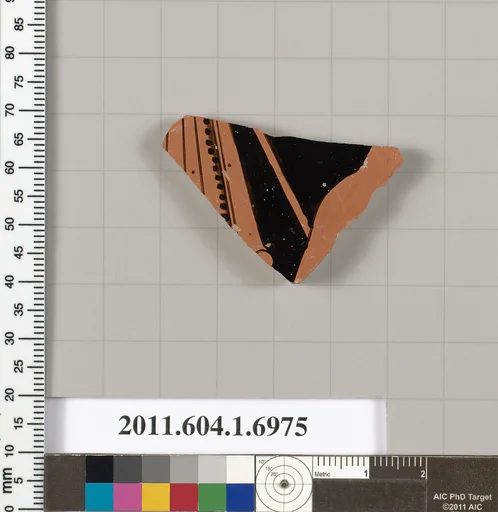 Terracotta fragment of a kylix (drinking cup)