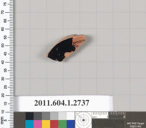 Terracotta fragment of a kylix (drinking cup)