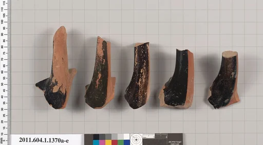 Terracotta fragments of kylikes (drinking cups)