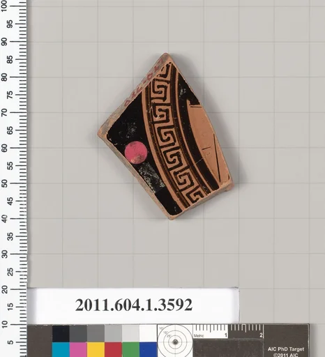 Terracotta fragment of a kylix (drinking cup)