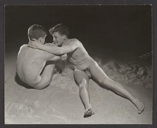 [Two Male Nudes on Sand]