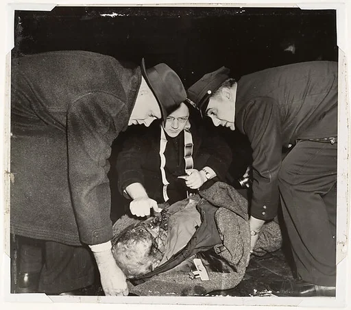 Tramp on Lower East Side Receiving the Last Rites