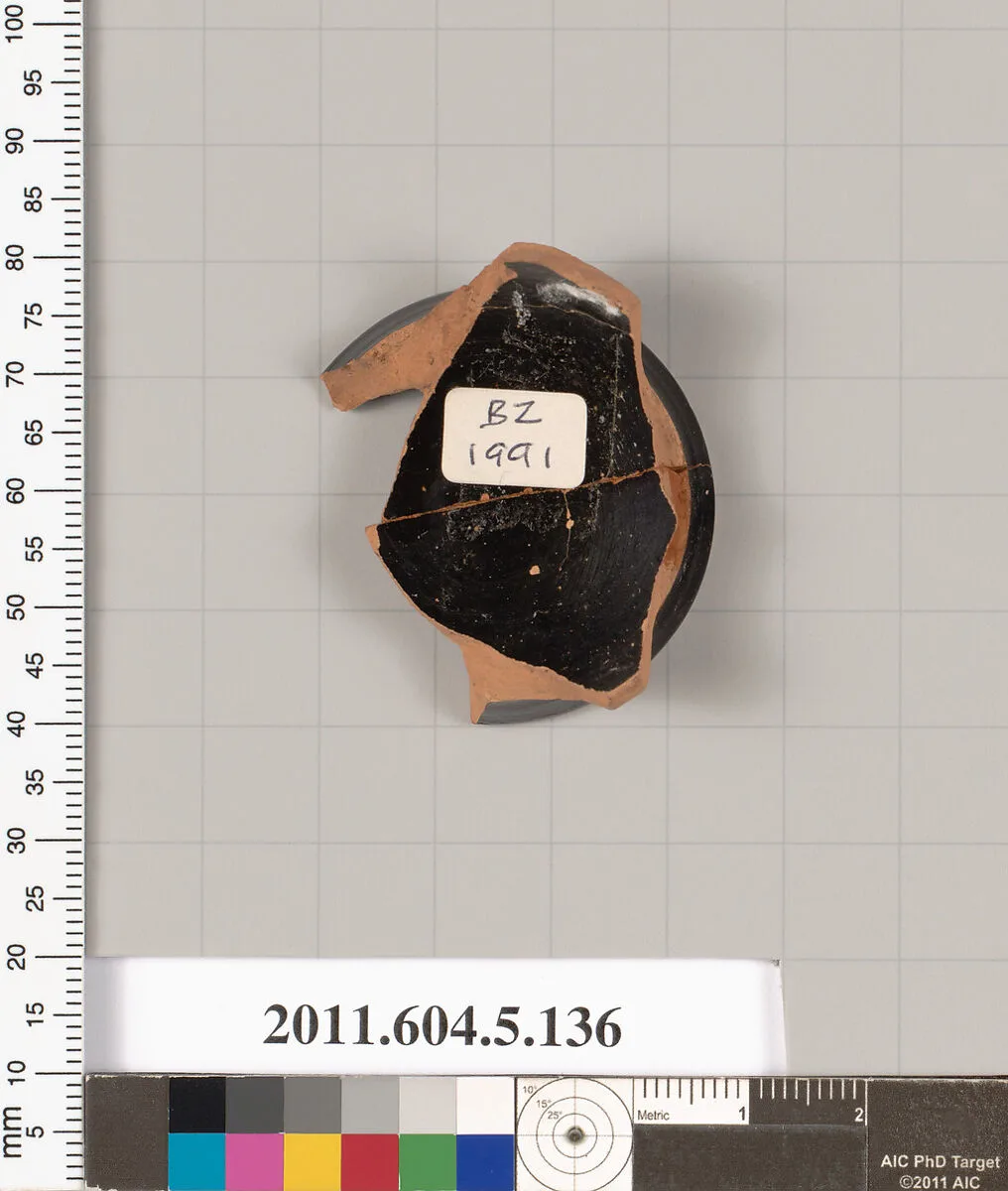 Terracotta fragment of a kylix (drinking cup)? — Unknown