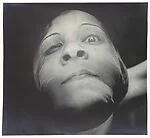 [Léonor Fini Wearing Stocking Over Face]