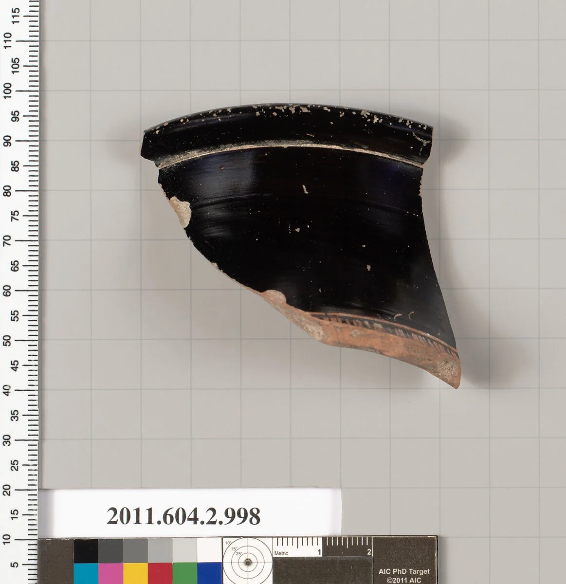 Terracotta fragment of an oinochoe: olpe (jug) — Unknown