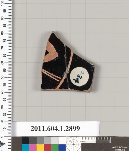 Terracotta fragment of a kylix (drinking cup)